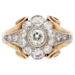 Vintage Retro 2.5ct Diamond Cluster Ring, highly decorative statement diamond ring. The central diamond floral cluster tapers down the shoulders in 14ct yellow gold with pierced scrolled mount and under-gallery. Circa 1950s