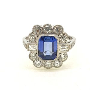 2ct Emerald Cut Sapphire and Diamond Floral Cluster Ring in Platinum