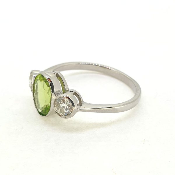 1.50ct Oval Peridot and Diamond Trilogy Engagement Ring in Platinum