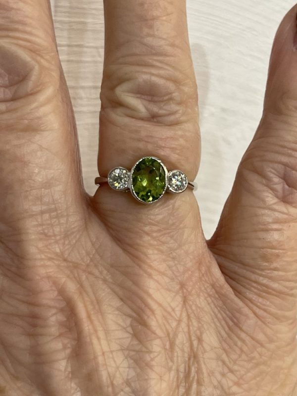 1.50ct Oval Peridot and Diamond Three Stone Engagement Ring in Platinum