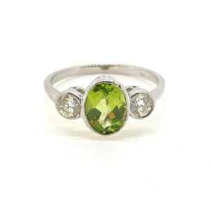 1.50ct Oval Peridot and Diamond Three Stone Engagement Ring in Platinum