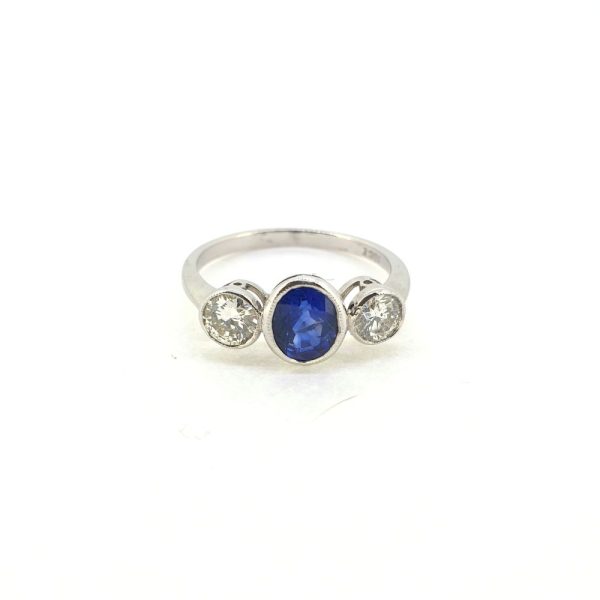 Modern 1.15ct Sapphire and Diamond Three Stone Engagement Ring
