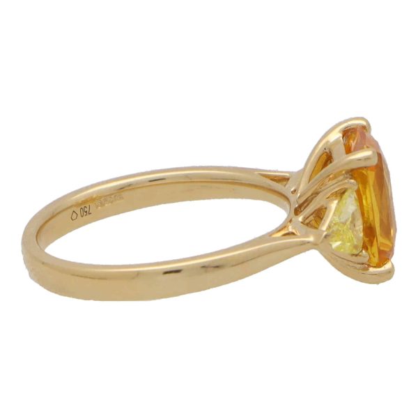 3.05ct Radiant Cut Orange Sapphire and Trillion Cut Fancy Yellow Diamond Three Stone Engagement Ring