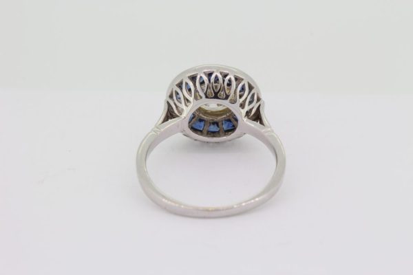 1.21ct Diamond and Calibre Sapphire Target Cluster Engagement Ring