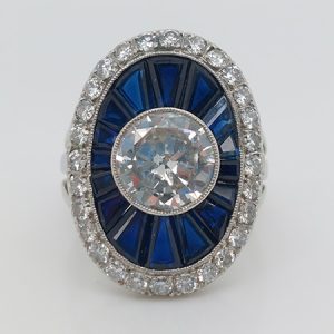 1.72ct Diamond and Calibre Sapphire Target Cluster Ring