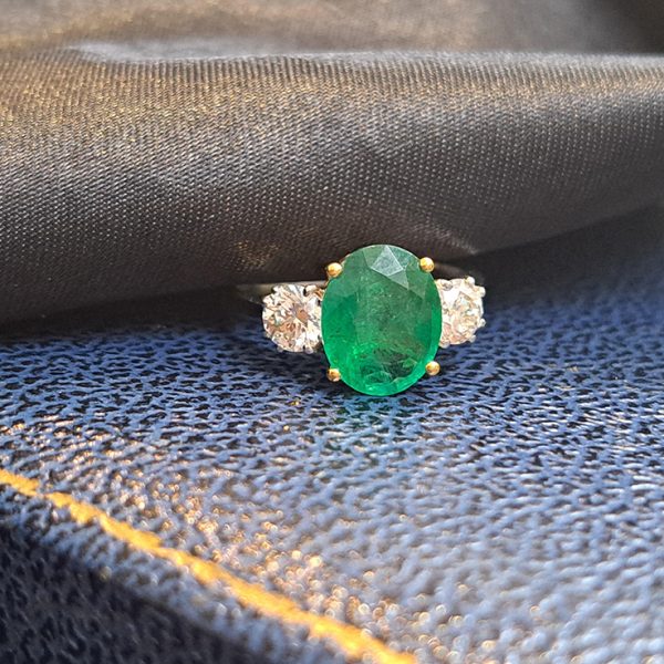 2.44ct Oval Emerald and Diamond Three Stone Engagement Ring