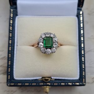 Antique Emerald and Diamond Floral Cluster Engagement Ring