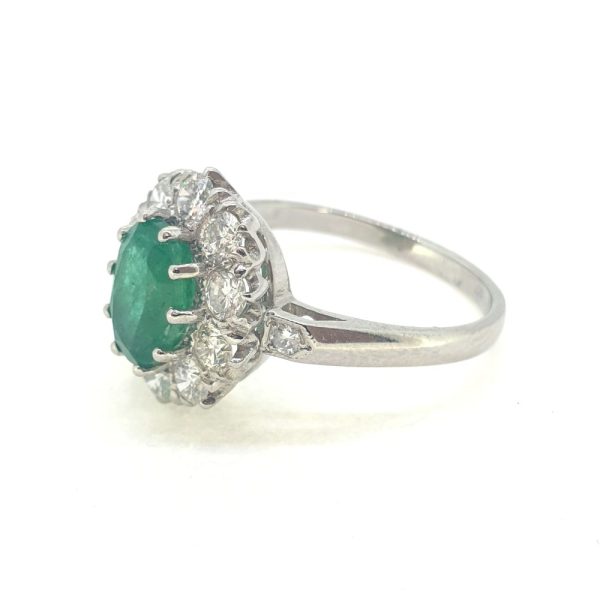 1.31ct Oval Emerald and Diamond Cluster Engagement Ring in Platinum
