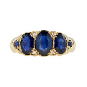 Antique Style Oval Blue Sapphire Three Stone Ring with Diamonds