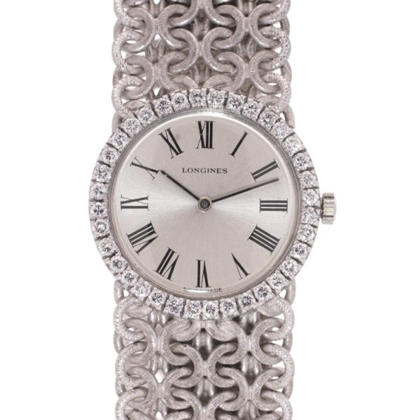 Ladies Vintage Longines 18ct White Gold Watch with Diamond Bezel on a woven design 18ct white gold strap. Circa 1970s