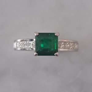 1.15ct Princess Cut Colombian Emerald Solitaire Ring with Princess Cut Diamond Shoulders in 18ct white gold