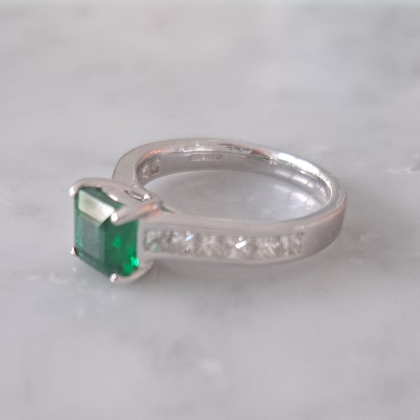 1.15ct Square Cut Colombian Emerald Solitaire Engagement Ring with Princess Cut Diamond Shoulders in 18ct white gold