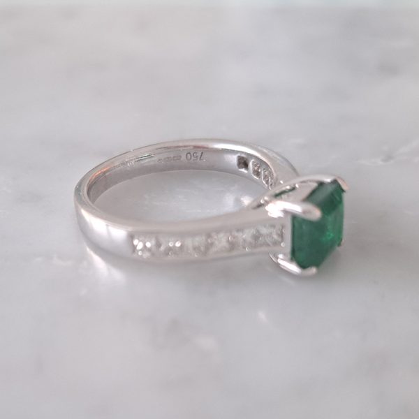 1.15ct Square Cut Colombian Emerald Solitaire Engagement Ring with Princess Cut Diamond Shoulders in 18ct white gold