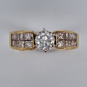 Vintage 0.65ct Diamond Ring with Princess Diamond Shoulders