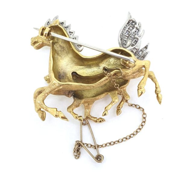 Diamond Set Horse and Foal Gold Brooch, 18ct yellow gold depicting a horse and foal galloping with diamond set manes and tails, Circa 1975