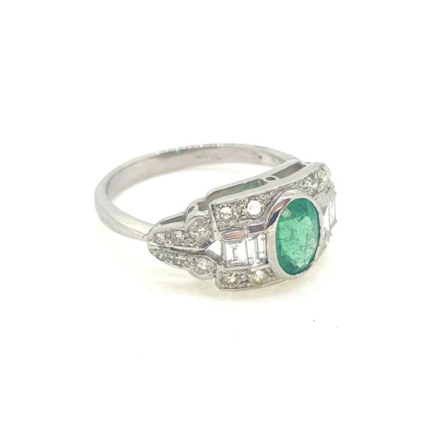 0.75ct Oval Emerald and Diamond Cluster Dress Ring in Platinum