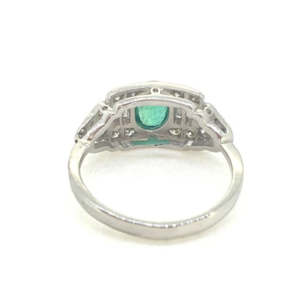 0.75ct Oval Emerald and Diamond Cluster Dress Ring in Platinum