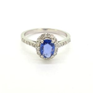 0.75ct Oval Blue Sapphire and Diamond Cluster Engagement Ring