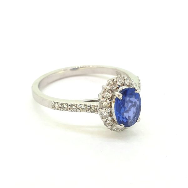 0.75ct Sapphire and Diamond Oval Cluster Engagement Ring