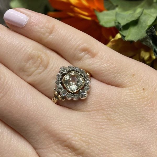 Antique French Cushion Cut Citrine and Old Cut Diamond Cluster Ring dating from the Louis Philippe I period crafted in the Georgian style