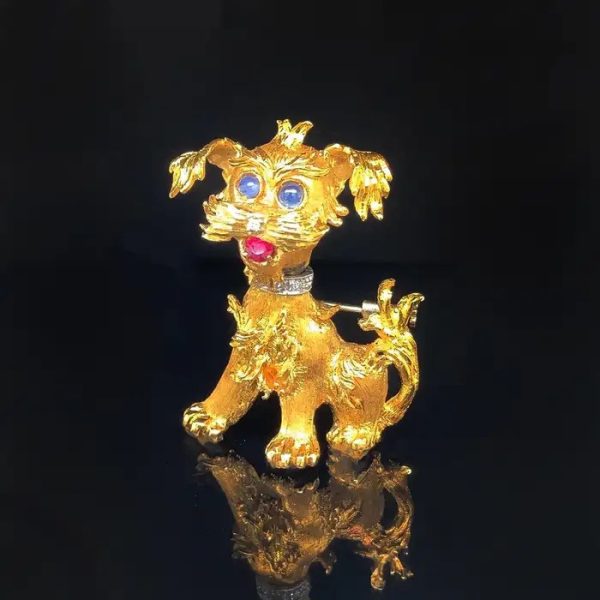 Vintage Italian Gem Set Gold Schnauzer Dog Brooch, with diamond nose and collar, cabochon sapphire eyes and ruby tongue, Circa 1960s