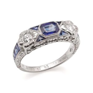 0.63ct Emerald Cut Sapphire and Diamond Trilogy Ring
