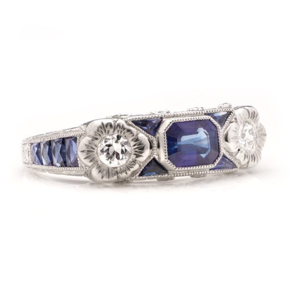 0.63ct Emerald Cut Sapphire and Diamond Three Stone Trilogy Ring in Platinum
