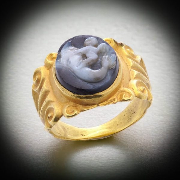 Antique Chalcedony Cameo and 22ct Yellow Gold Ring featuring Eros Cupid riding a dolphin. 19th century Circa 1890s