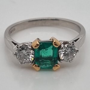 0.80ct Emerald Cut Colombian Emerald and Diamond Trilogy Engagement Ring in Platinum