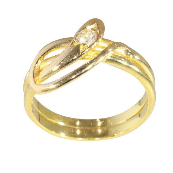 Gold and diamond snake ring