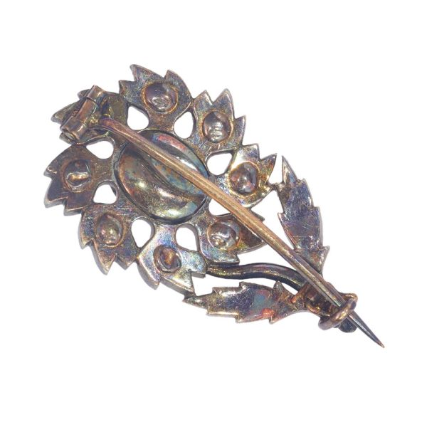 Antique diamond brooch in silver and rose gold.