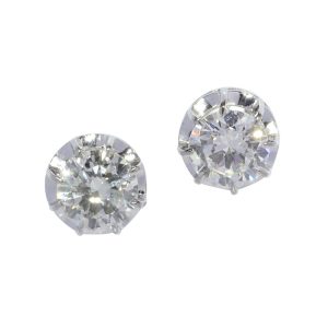 Vintage brilliant cut diamond stud earrings set in platinum circa 1950. Total diamond weight 2.40 carats.