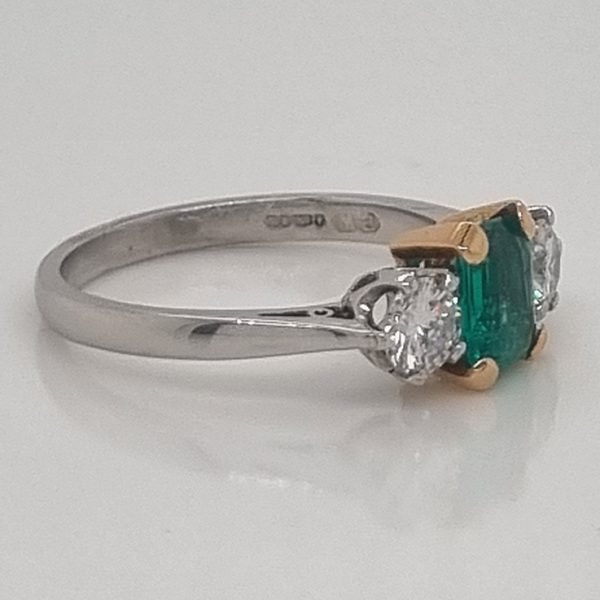 0.80ct Emerald Cut Colombian Emerald and Diamond Three Stone Engagement Ring in Platinum