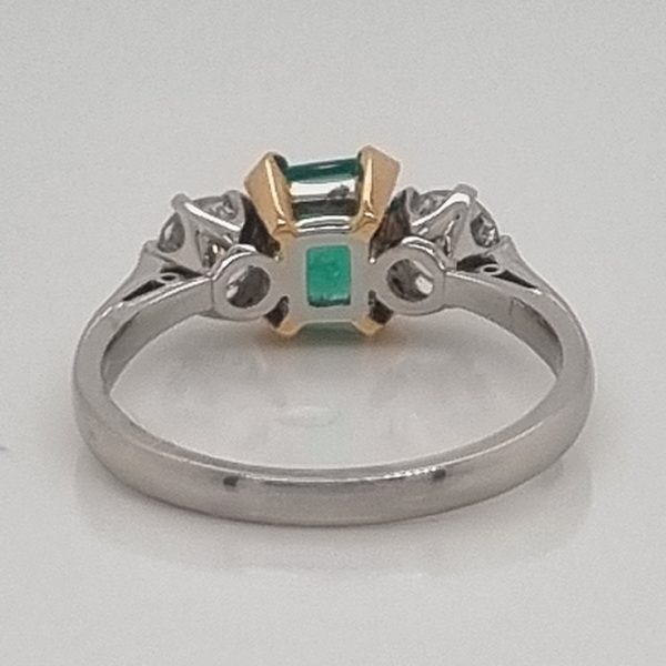 0.80ct Emerald Cut Colombian Emerald and Diamond Trilogy Engagement Ring in Platinum