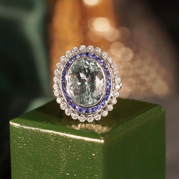 7.58ct Oval Aquamarine Sapphire and Diamond Cluster Dress Ring