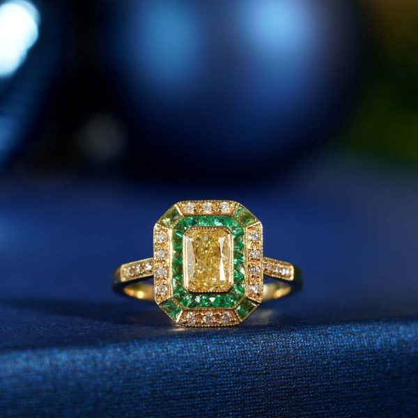 Emerald Cut Fancy Yellow Diamond and Emerald Cluster Engagement Ring