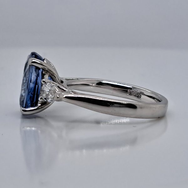 4.80ct Oval Sri Lanka Sapphire and Pear Cut Diamond Trilogy Three Stone Engagement Ring in platinum