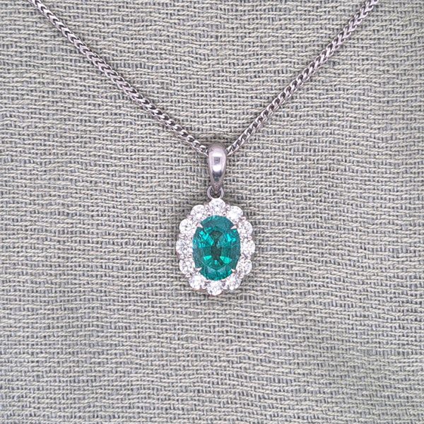 1.66ct Oval Emerald and Diamond Cluster Pendant with Chain