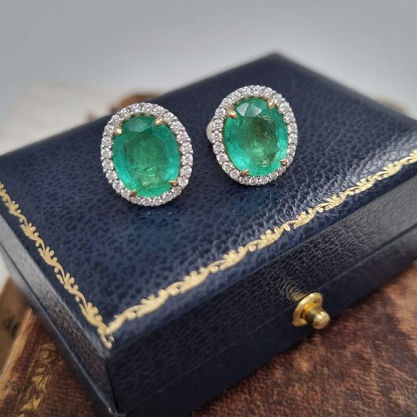 7.41ct Oval Emerald and Diamond Halo Cluster Stud Earrings