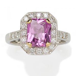 Pink sapphire diamond cluster ring in platinum.