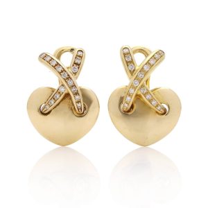 Chaumet gold heart-shaped clip earrings with X design set with diamonds.