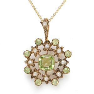 Edwardian antique seed pearl and peridot set pendant mounted in 9ct yellow gold.