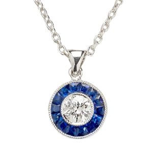 Sapphire and diamond set target pendant in 18 carat white gold.