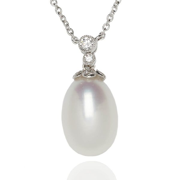 ear drop pearl and diamond Edwardian style pendant in 18ct white gold