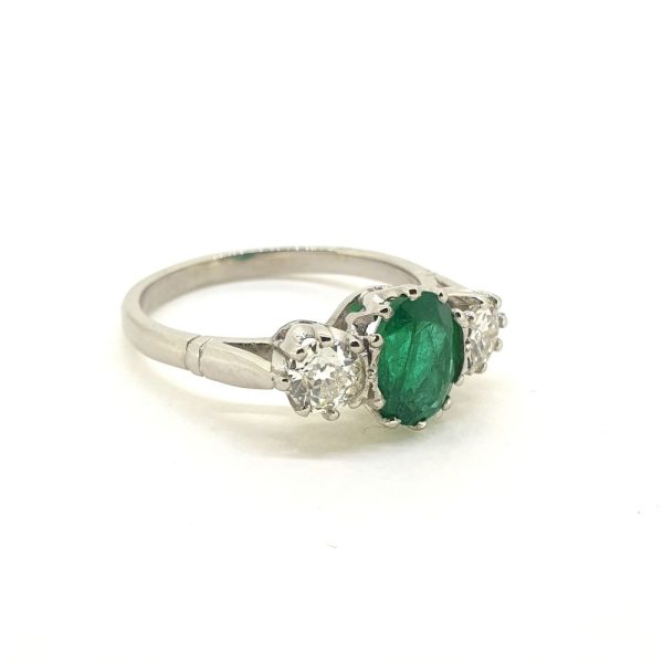 1.30ct Oval Emerald and Diamond Three Stone Engagement Ring in Platinum