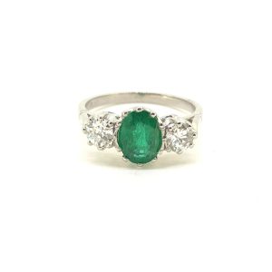 1.30ct Oval Emerald and Diamond Three Stone Engagement Ring in Platinum