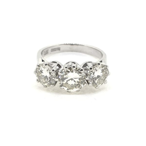 Vintage Diamond Three Stone Engagement Ring, 3 carat total, claw set with three round brilliant-cut diamonds in 18ct white gold. Circa 1994