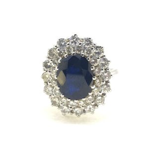 Vintage 4ct Oval Sapphire and Double Diamond Cluster Ring