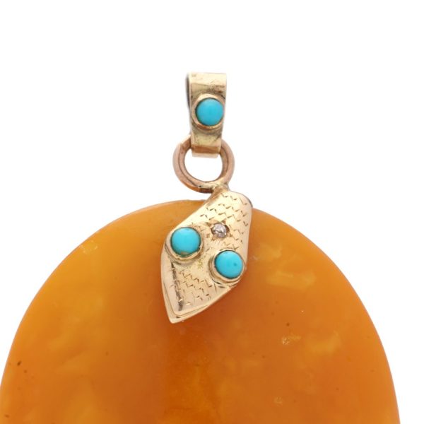 Vintage Amber pendant in rose gold with turquoise and diamond.