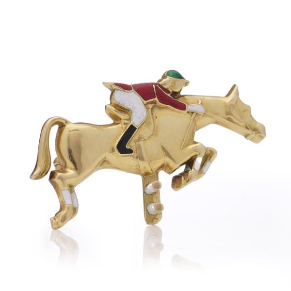 Jockey and horse brooch 18 carat gold and enamel.